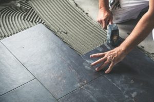 Gresham Tile Flooring Install by worker